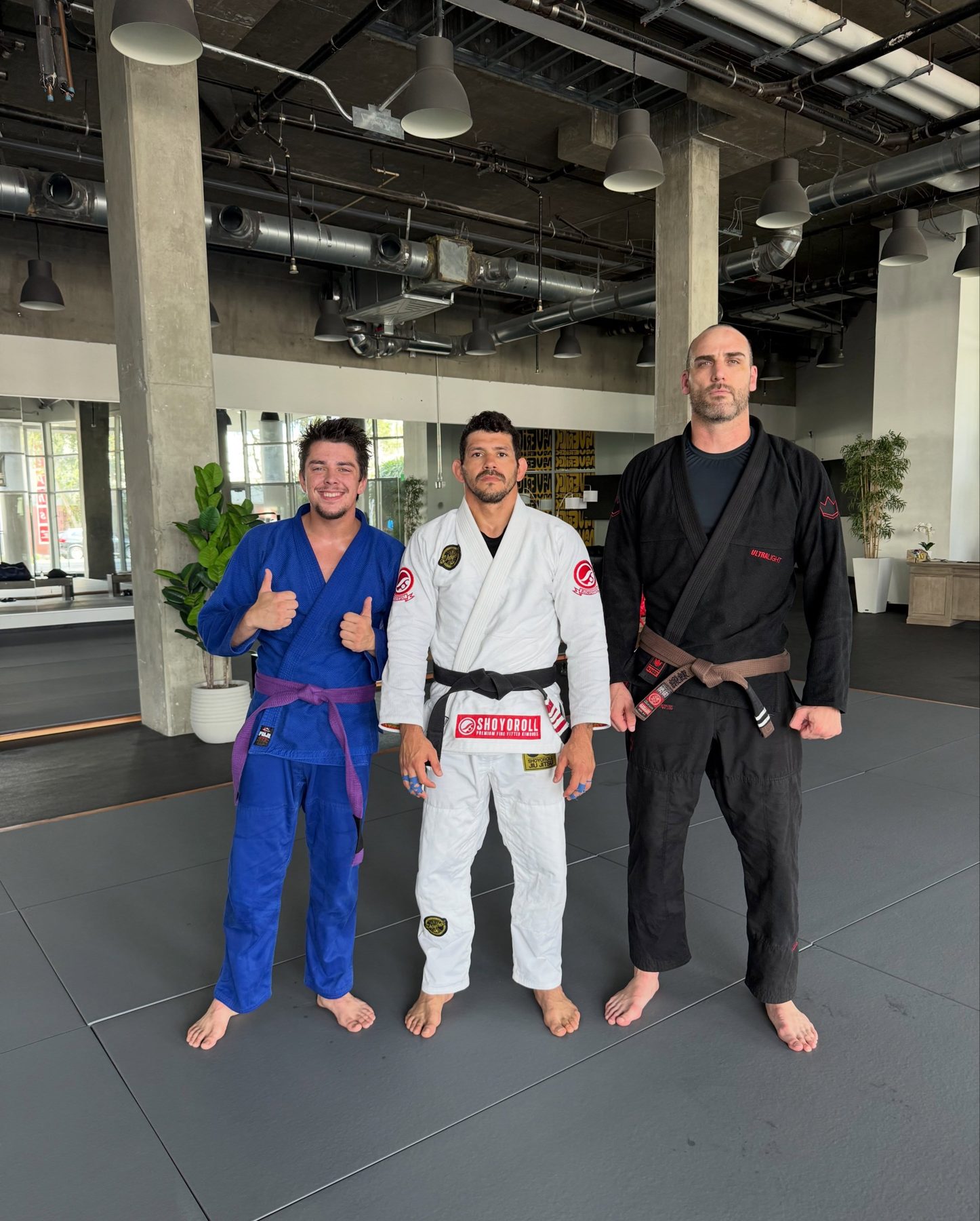 Students and coach on the mats